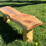 Redwood blue River Bench in a park setting