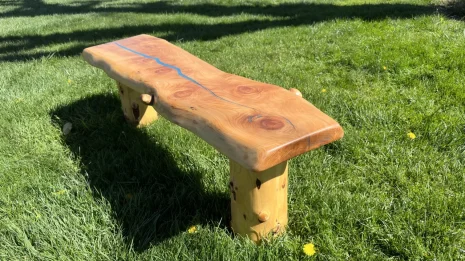 Redwood blue River Bench in a park setting Redwood blue River Bench in a park setting