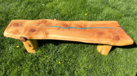 Redwood blue River Bench in a park setting Redwood blue River Bench in a park setting