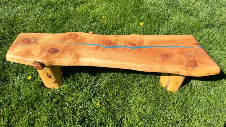 Redwood blue River Bench in a park setting
