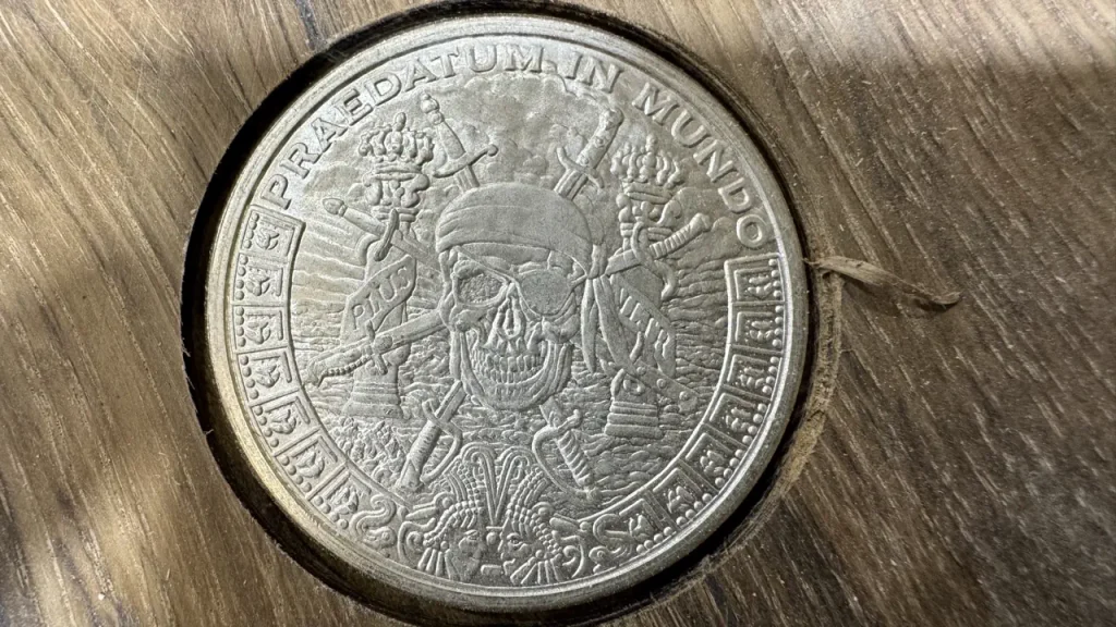 Embedding coins in the poker table