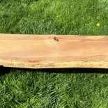 Oak Live Edge Bench in park setting