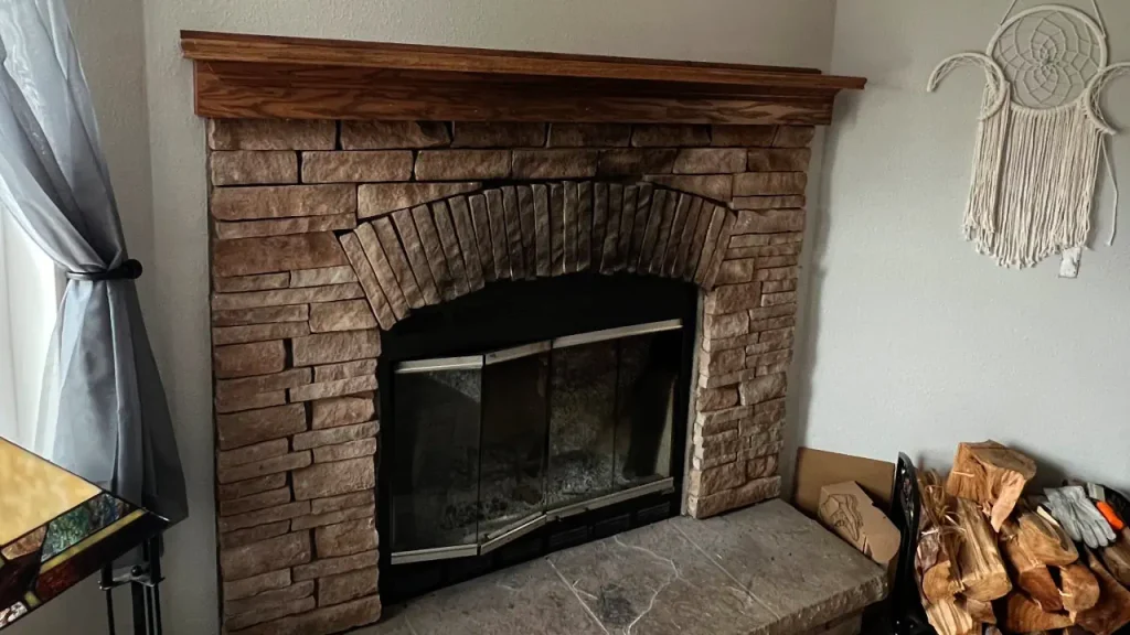 old mantle in customers house before bein taken out