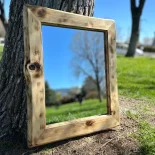 pine live edge mirror in a park setting