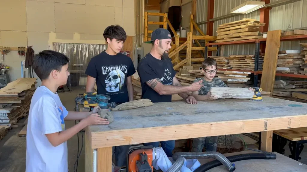Toby and sons in the shop doing family projects