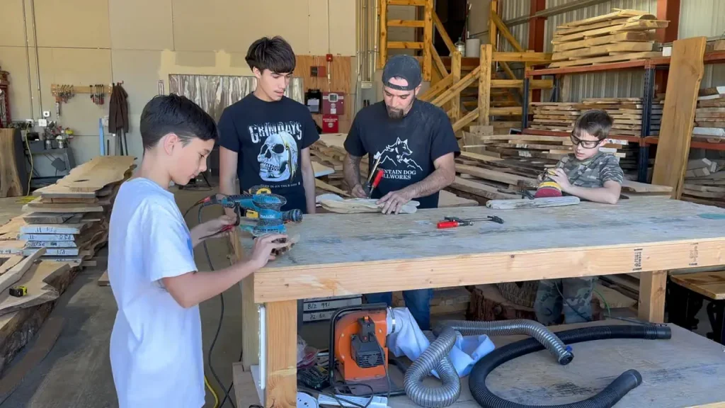Toby and sons in the shop doing family projects