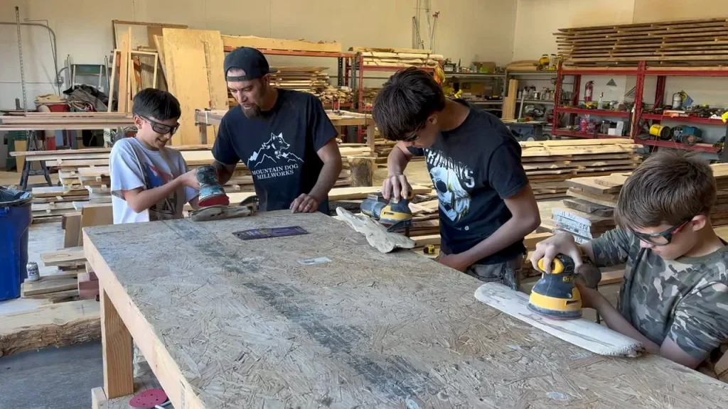 Toby and sons in the shop doing family projects