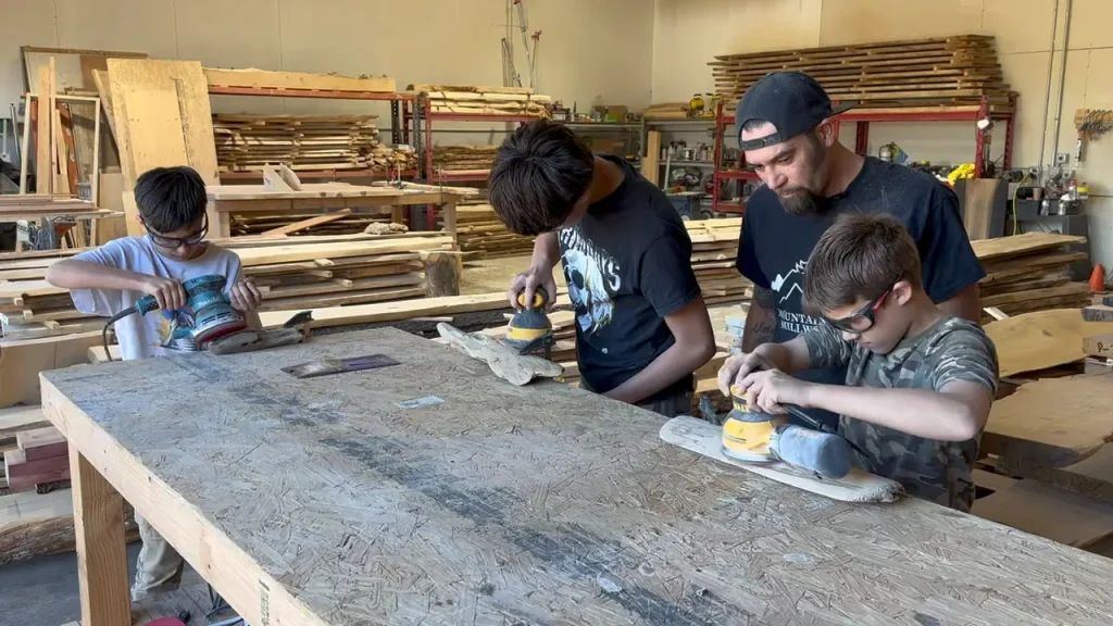 Toby and sons in the shop doing family projects