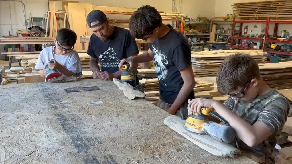 Toby and sons in the shop doing family projects