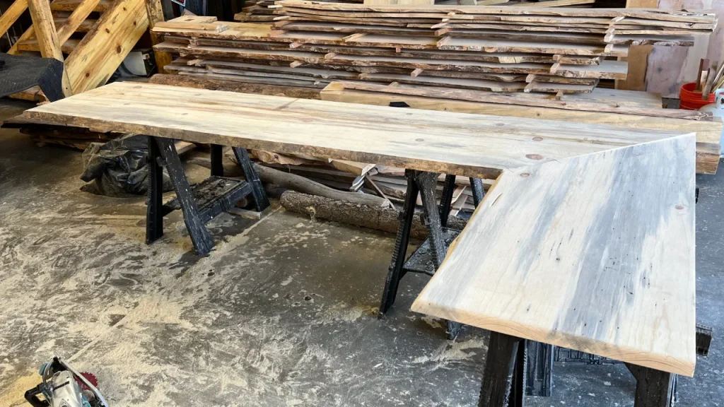 The counter top sections are assembled featuring the live edge