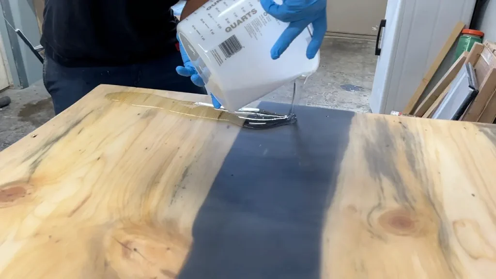 A top coat is applied to create a smooth, level surface.