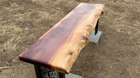 Redwood Outdoor Bench being installed