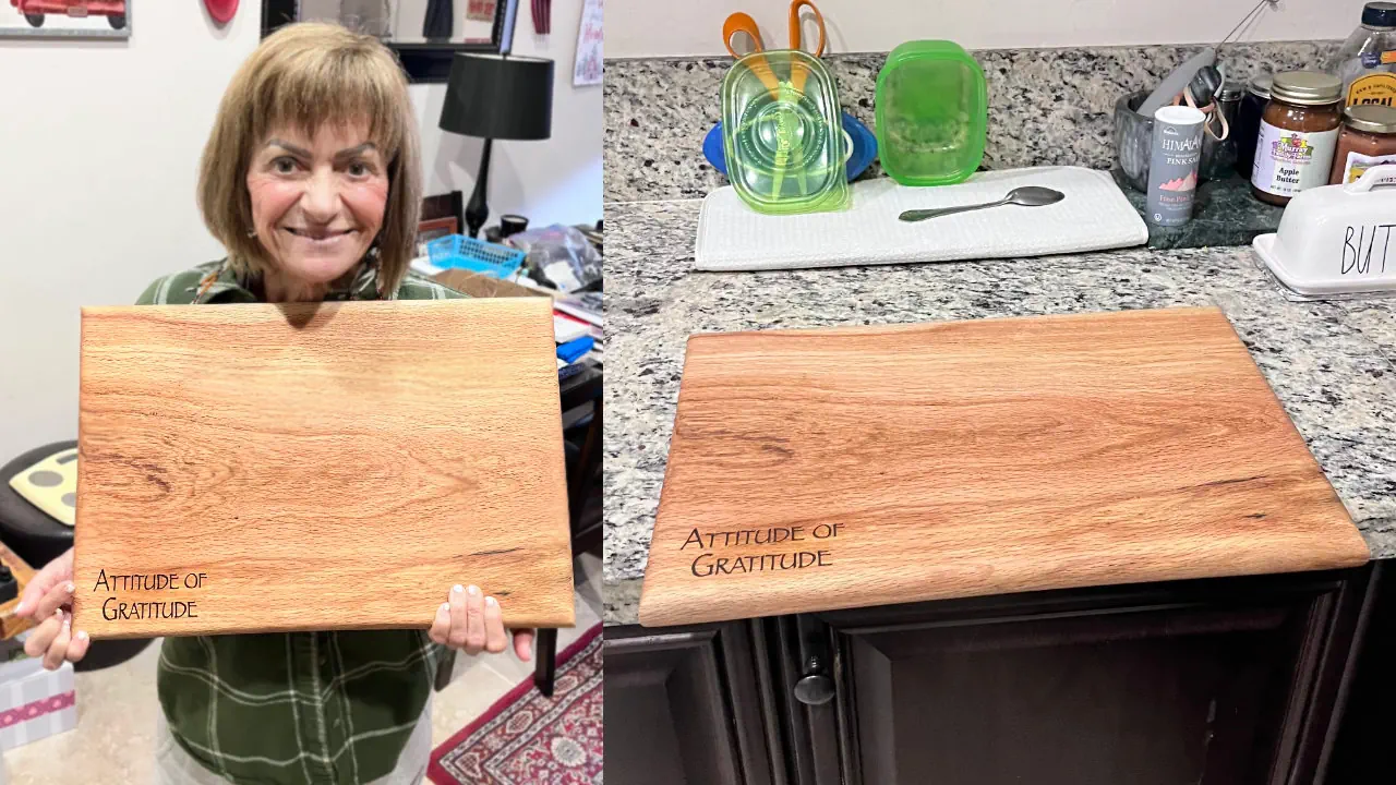 Katie Cooper cuttring board with Attitude of Gratitude laser engraving
